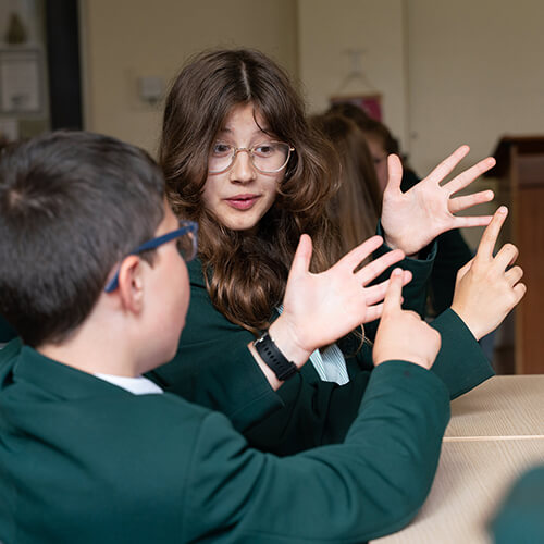 Students counting on their fingers