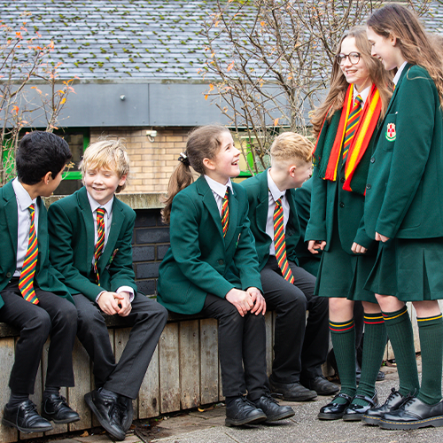 A group of students talking outside