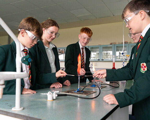 Students conducting a chemistry experiment