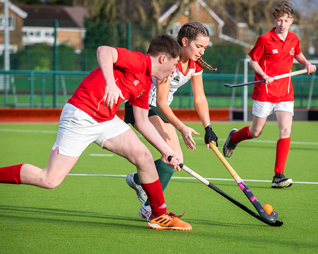 Students playing hockey